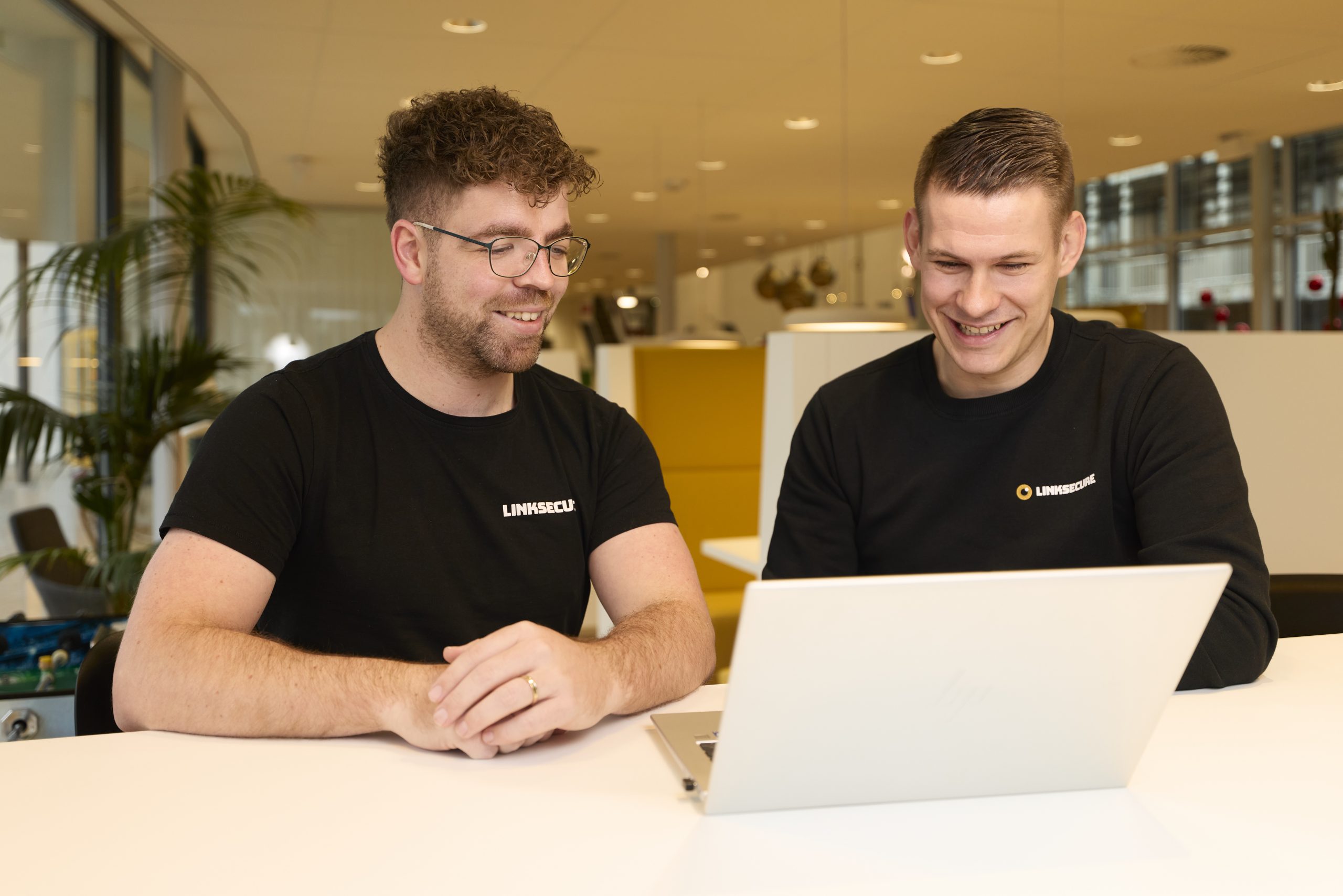 LinkSecure directeuren achter laptop